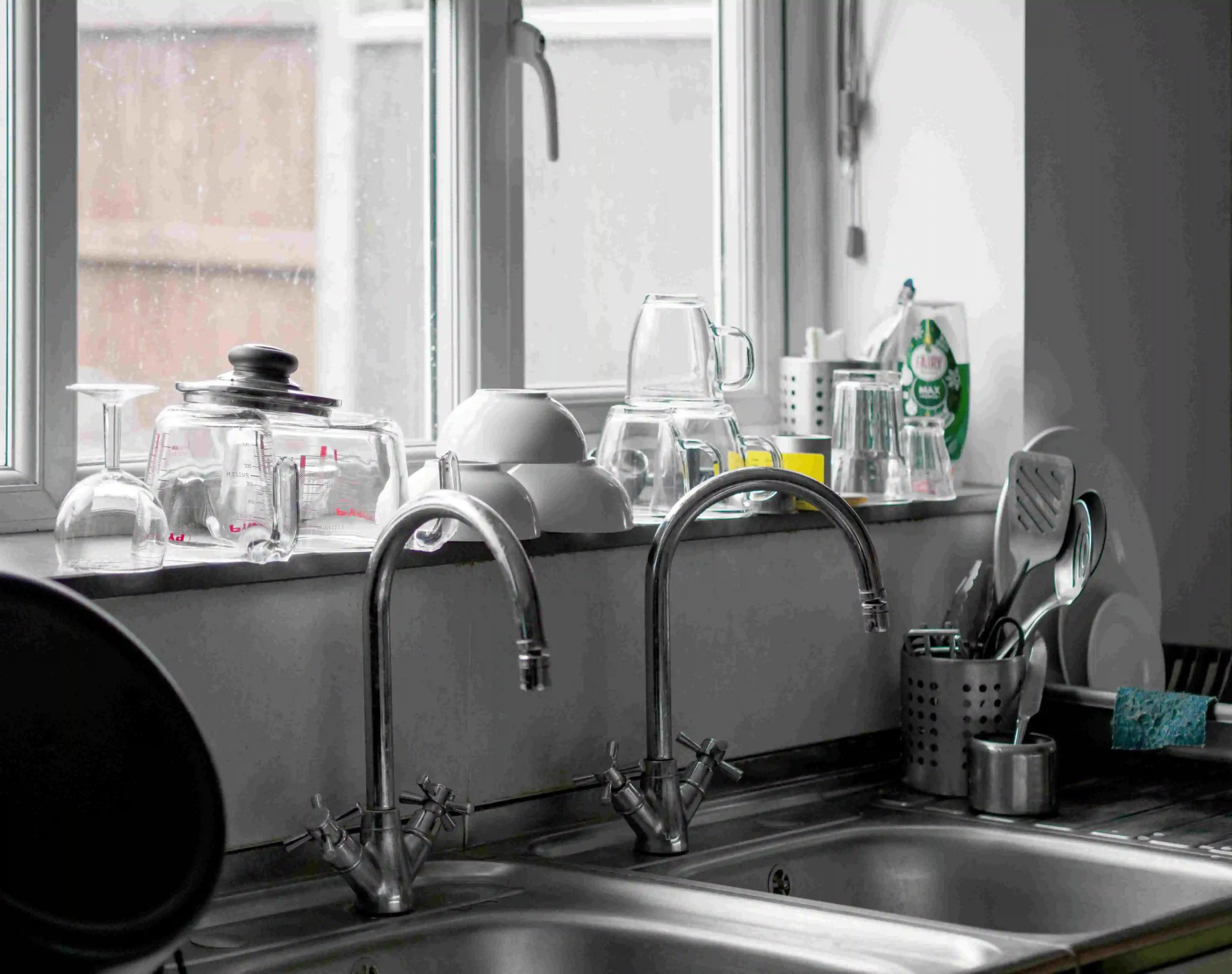 Licensed plumber completing faucet repair and replacement in a Palm Coast, FL home