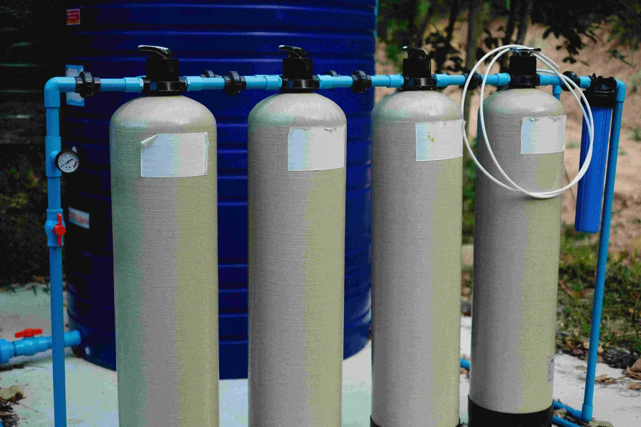 Whole house water filtration system components installed in a Palm Coast garage